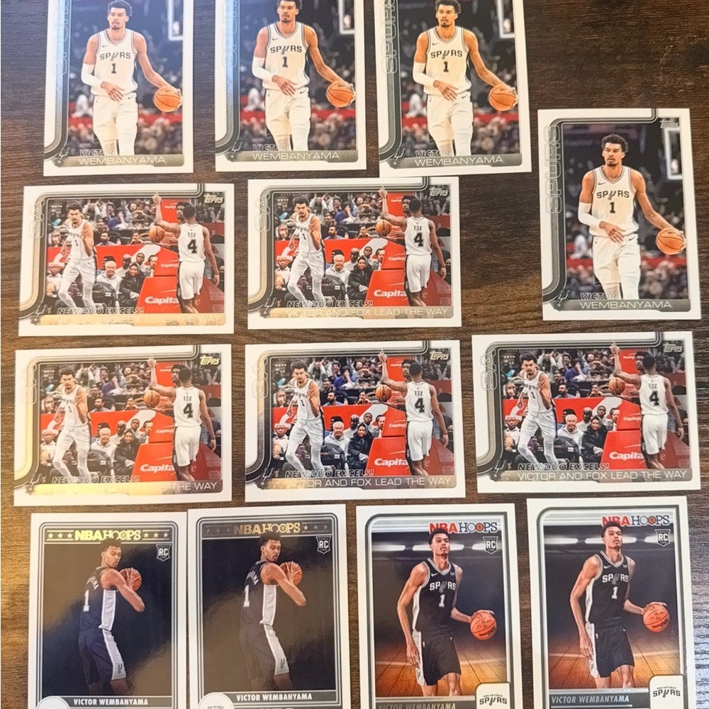 Wemby cards with 4 rookies. Good condition.